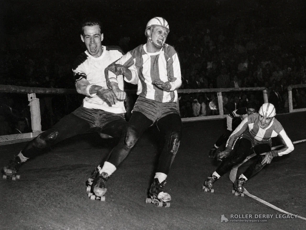 Unidentified Roller Derby Skaters Racing Through a Turn