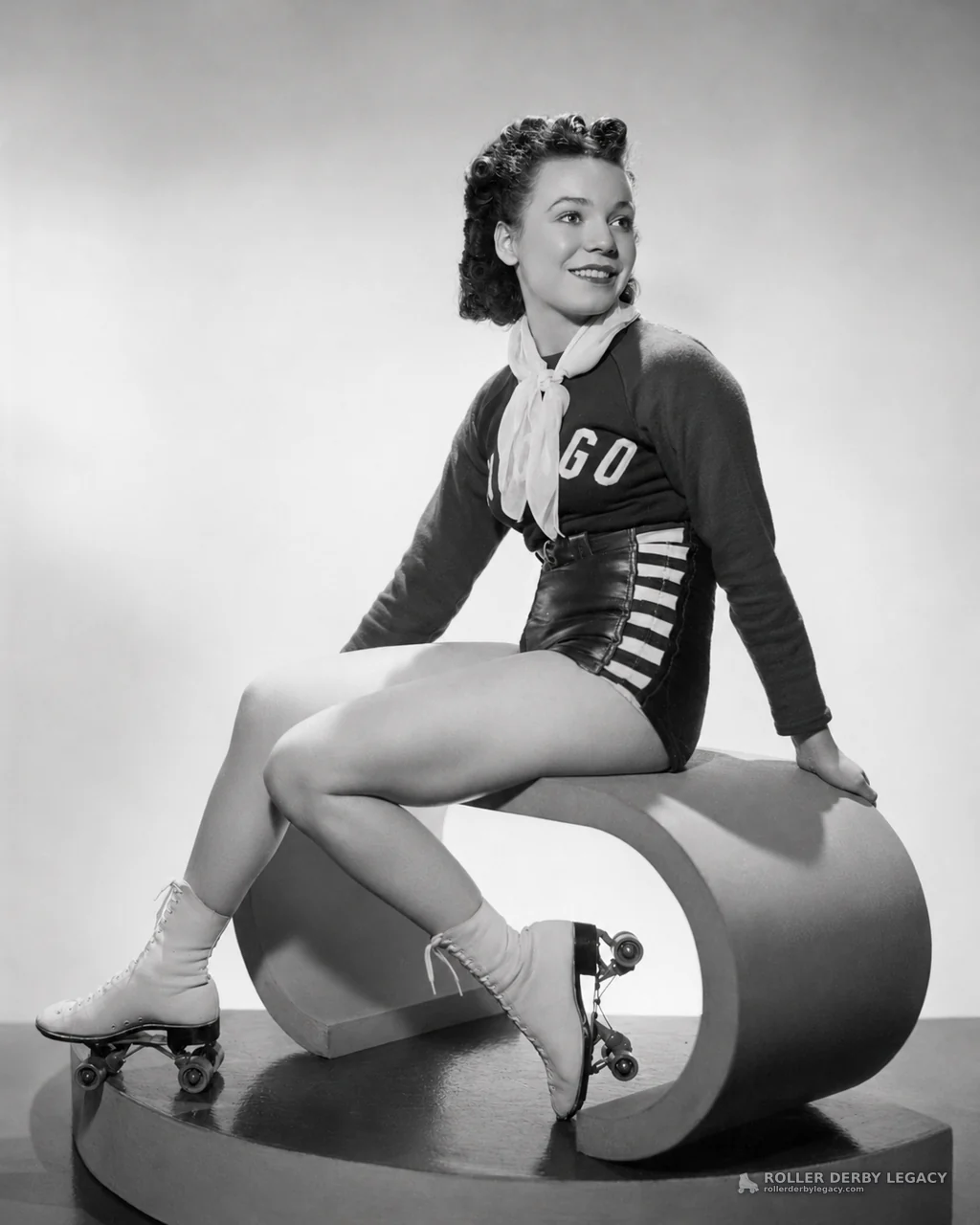 Studio Portrait of a Roller Skater with “GO” Uniform Lettering