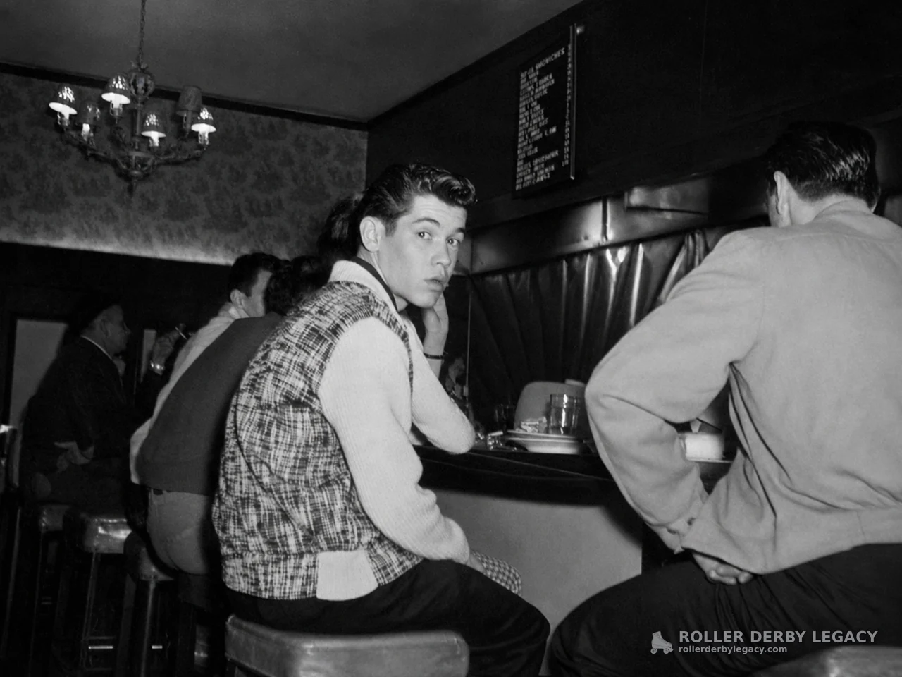 People Seated at a Bar Counter