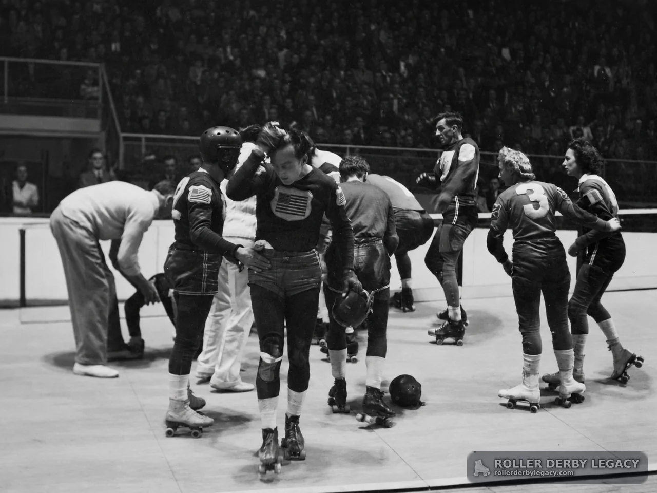 Roller Derby Skaters Gather on Indoor Rink