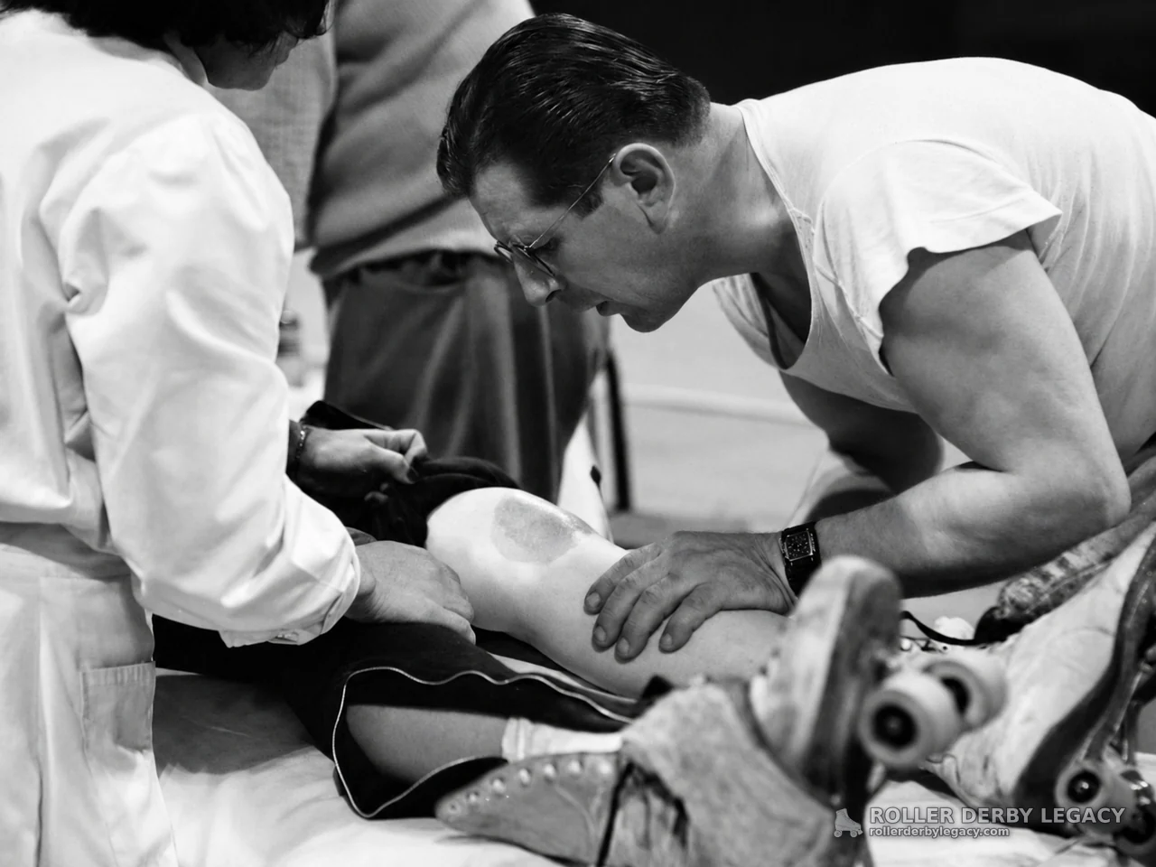 Skater Receiving Attention for Leg Injury