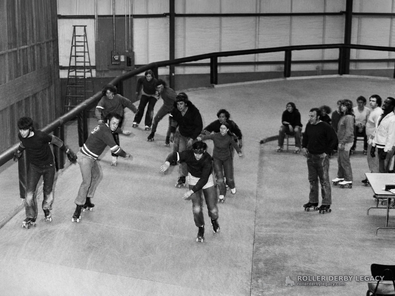 Skaters Circling an Indoor Roller Rink