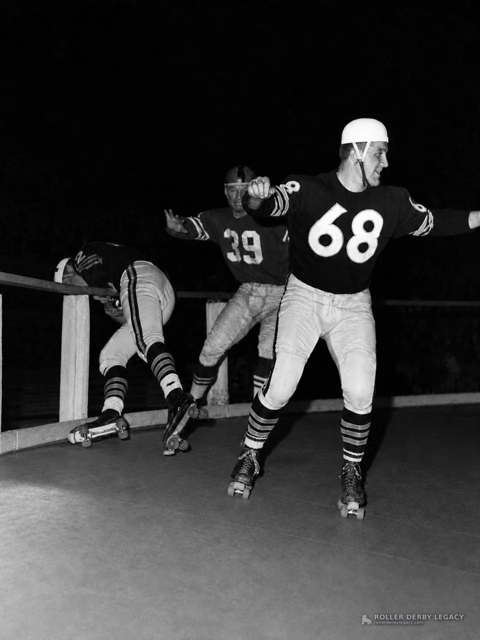 Roller Derby Skaters in Action with Jerseys 68 and 39