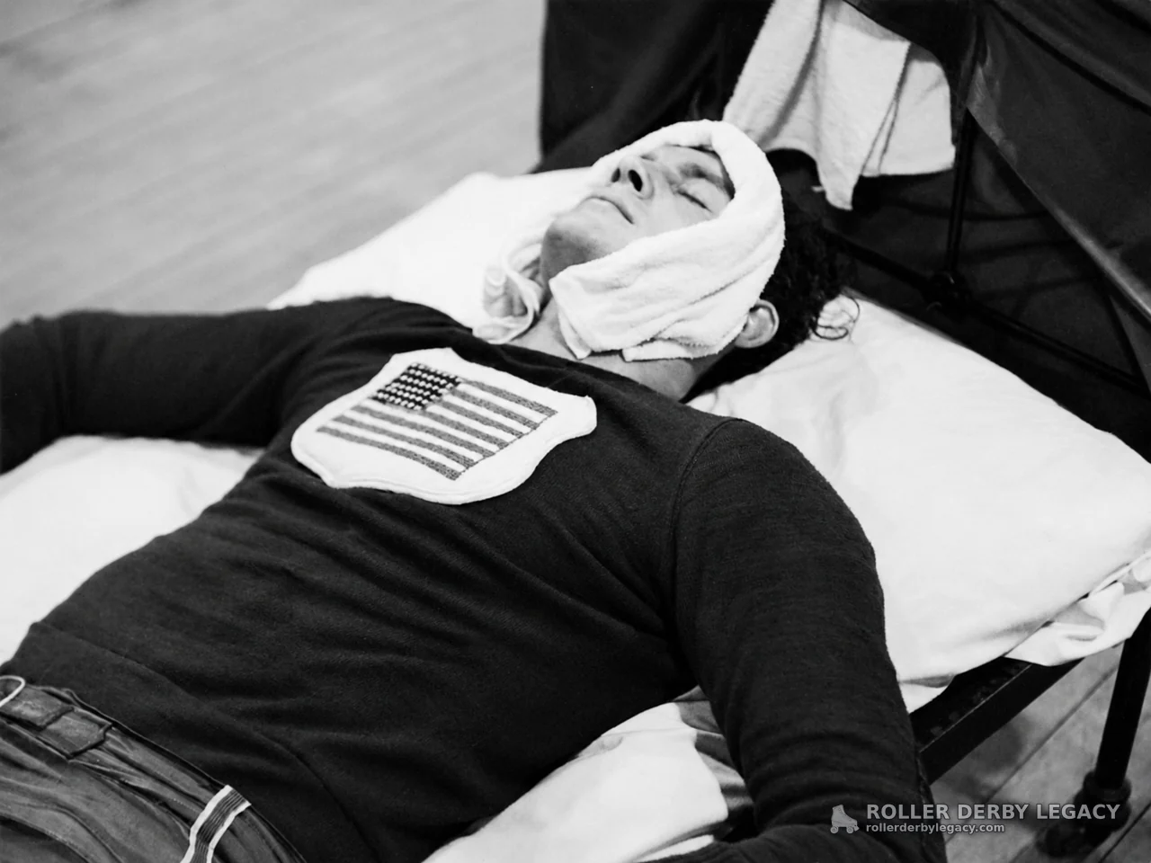 Unidentified Person Resting on a Cot