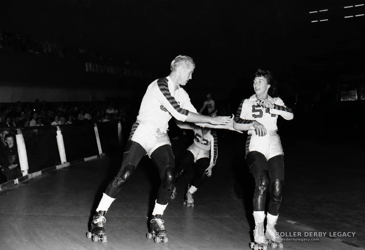 Roller Derby Skaters in Indoor Track Action