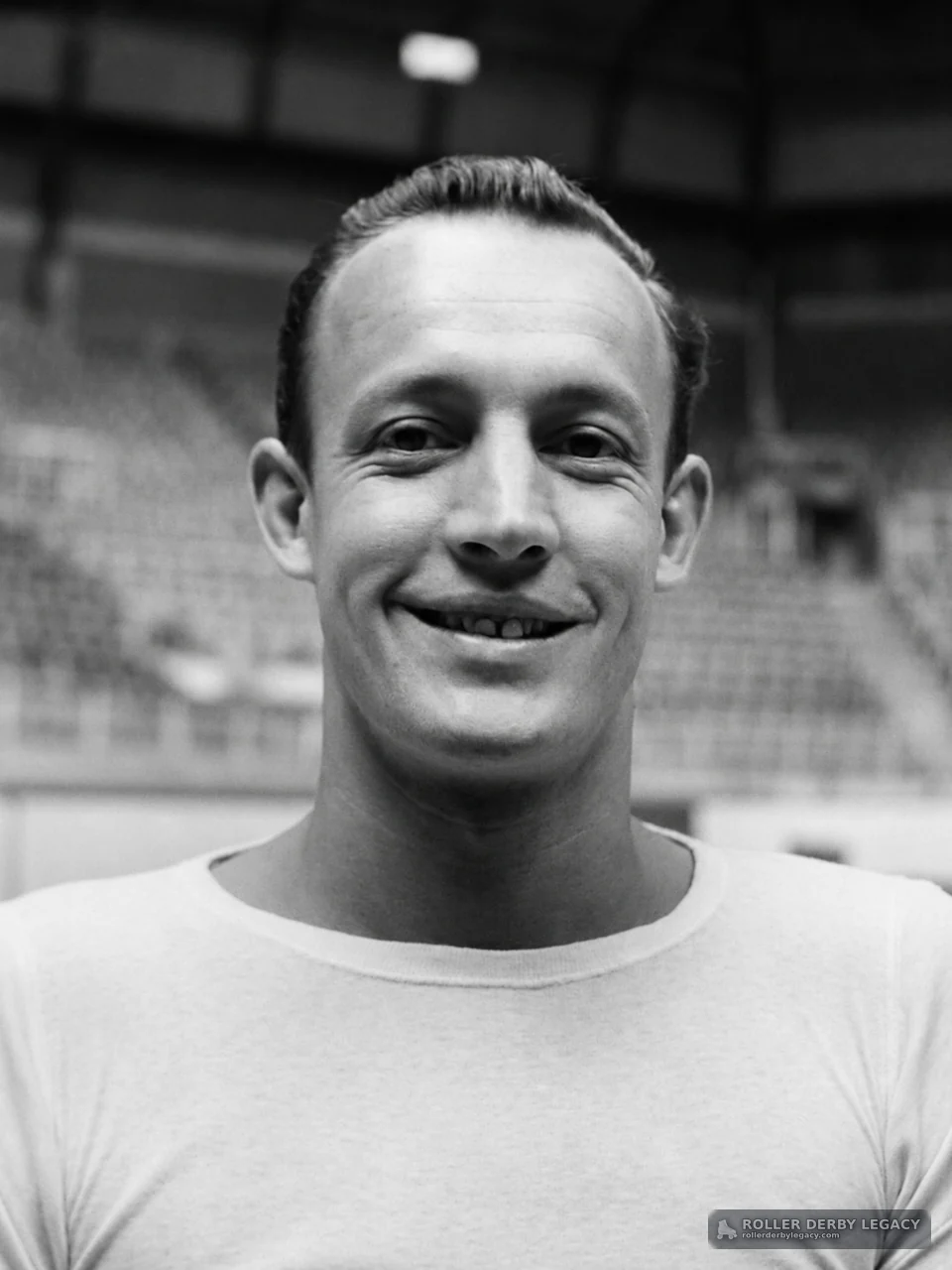 Smiling Man in Arena Portrait