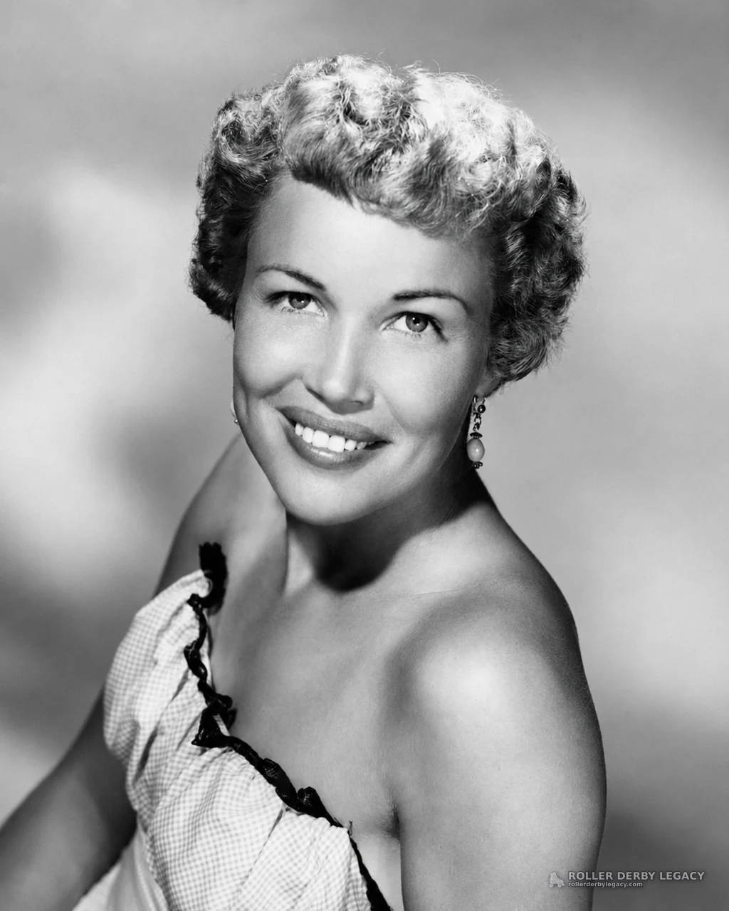 Studio Portrait of a Smiling Woman