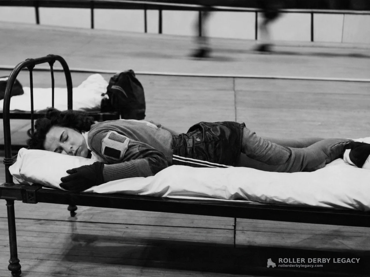 Resting on a Cot Beside the Rink