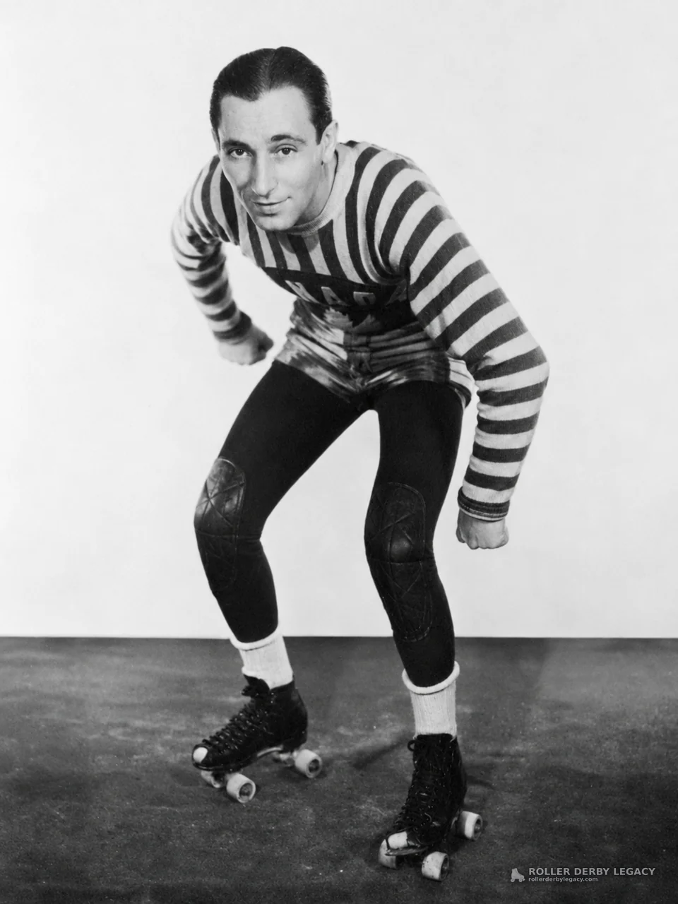 Studio Portrait of Roller Skater in Striped Uniform