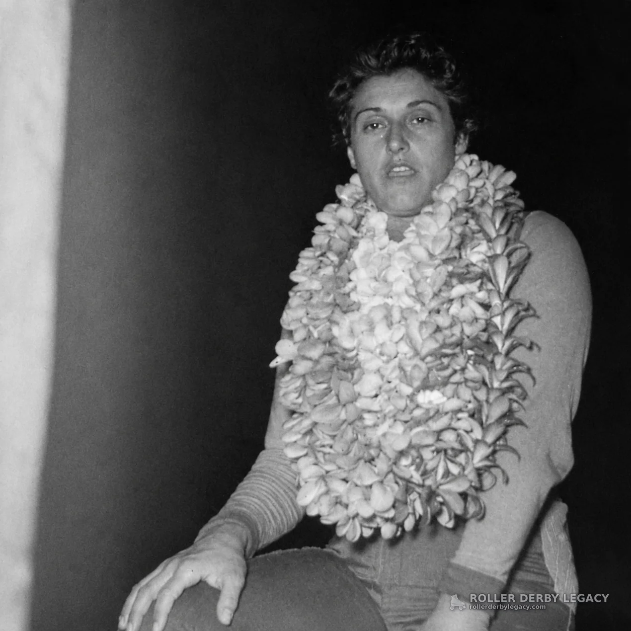 Seated Portrait with Flower Leis