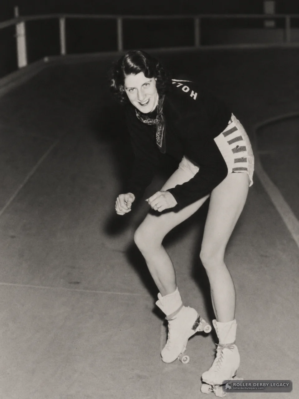 Skater Crouching on a Banked Track