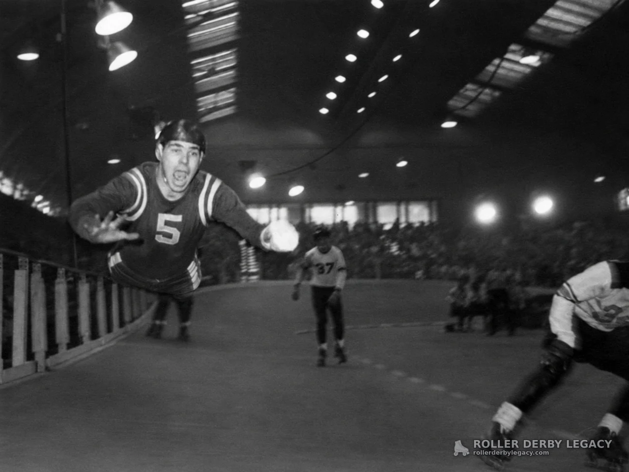 Indoor Roller Derby Action with Skaters 5 and 37