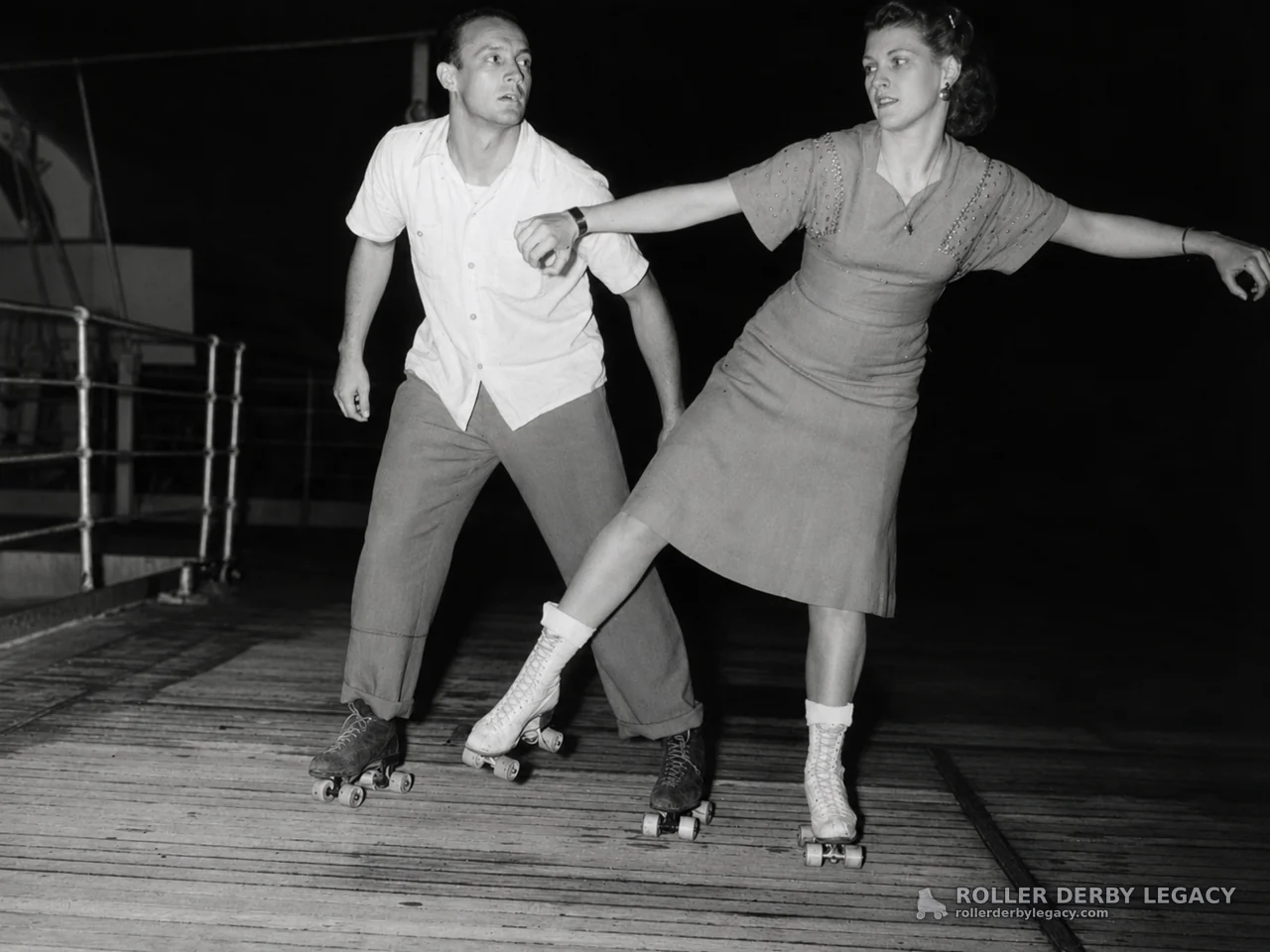 Pair Skating on a Wooden Floor