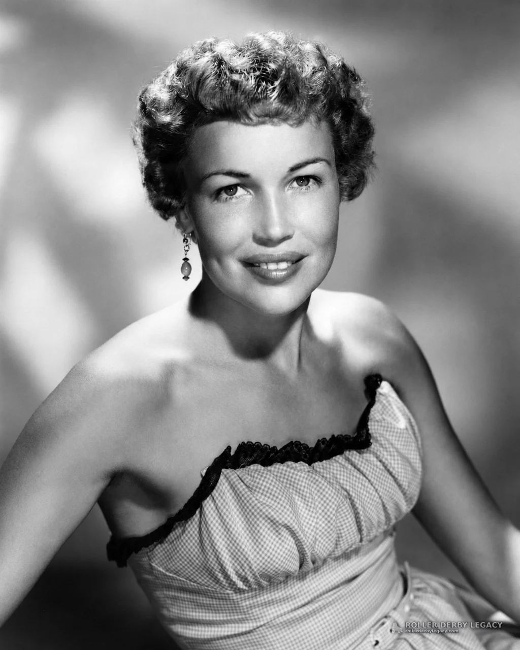 Studio Portrait of an Unidentified Woman in Strapless Dress