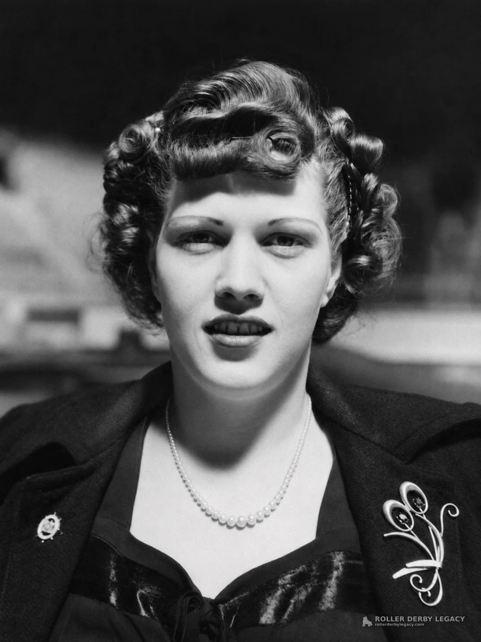 Black-and-White Portrait of Woman with Curled Hair