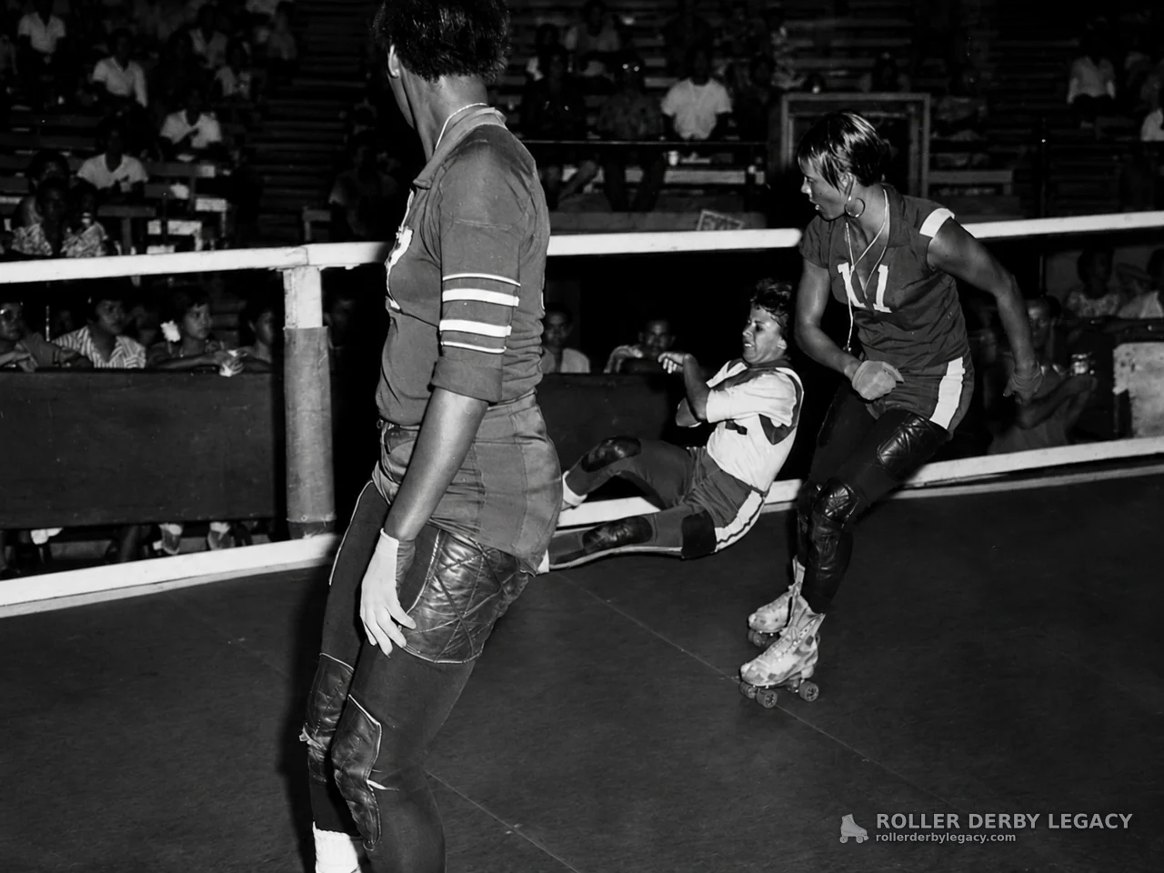Roller Derby Skaters on an Indoor Track