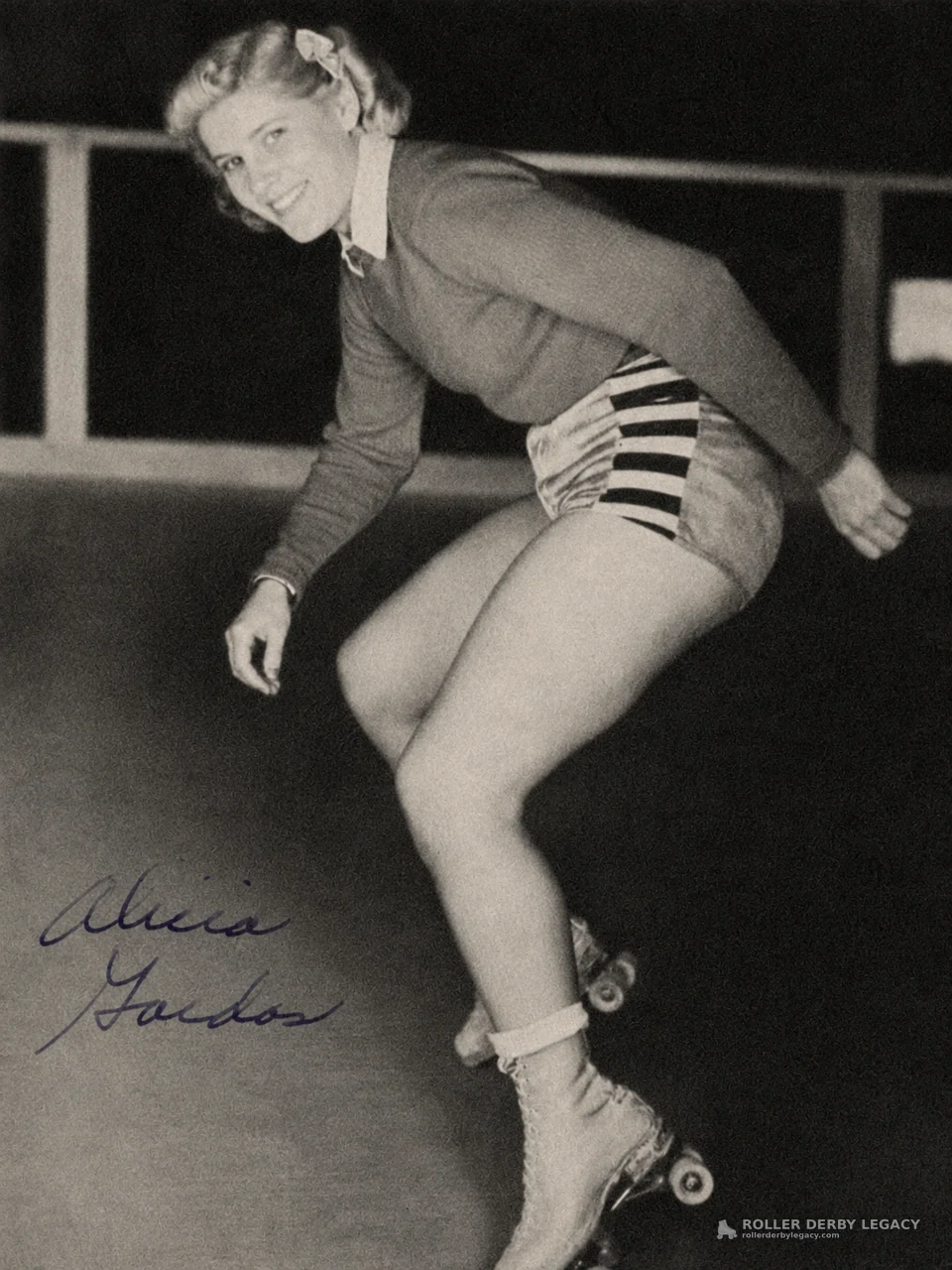Alicia Gaidas crouching on quad skates