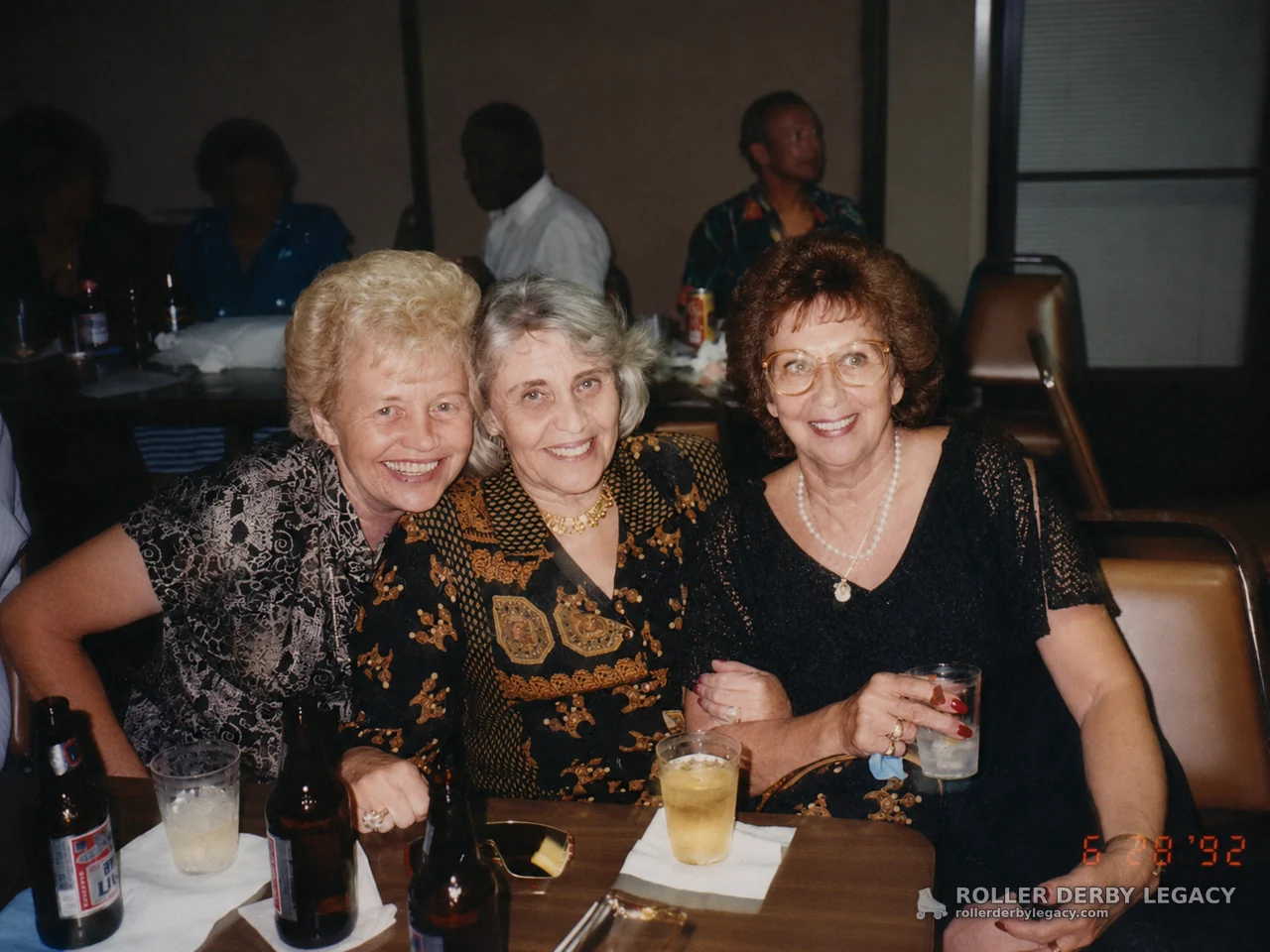Three Women at an Indoor Gathering, June 28, 1992