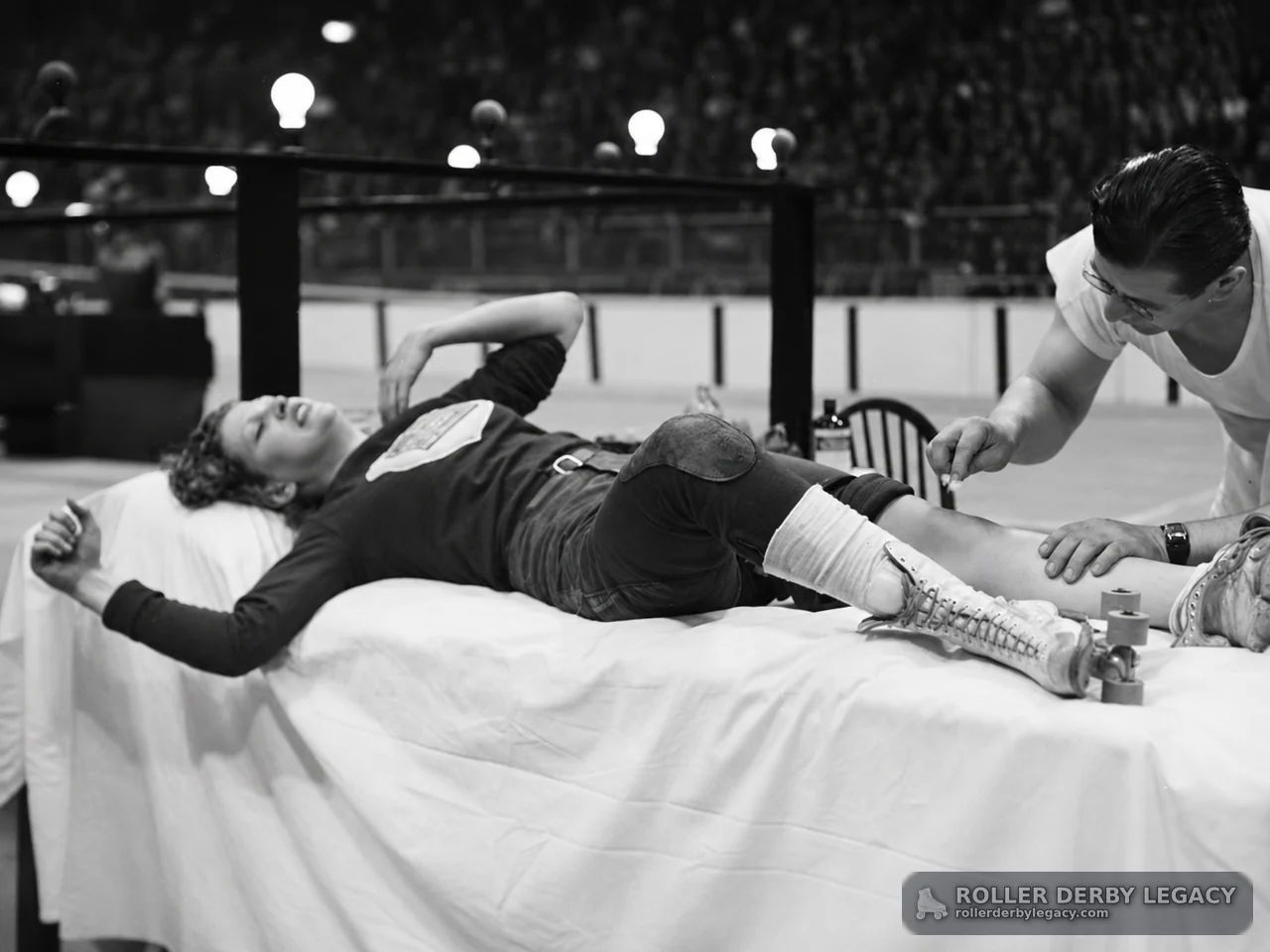 Roller Skater Treated Beside an Indoor Rink
