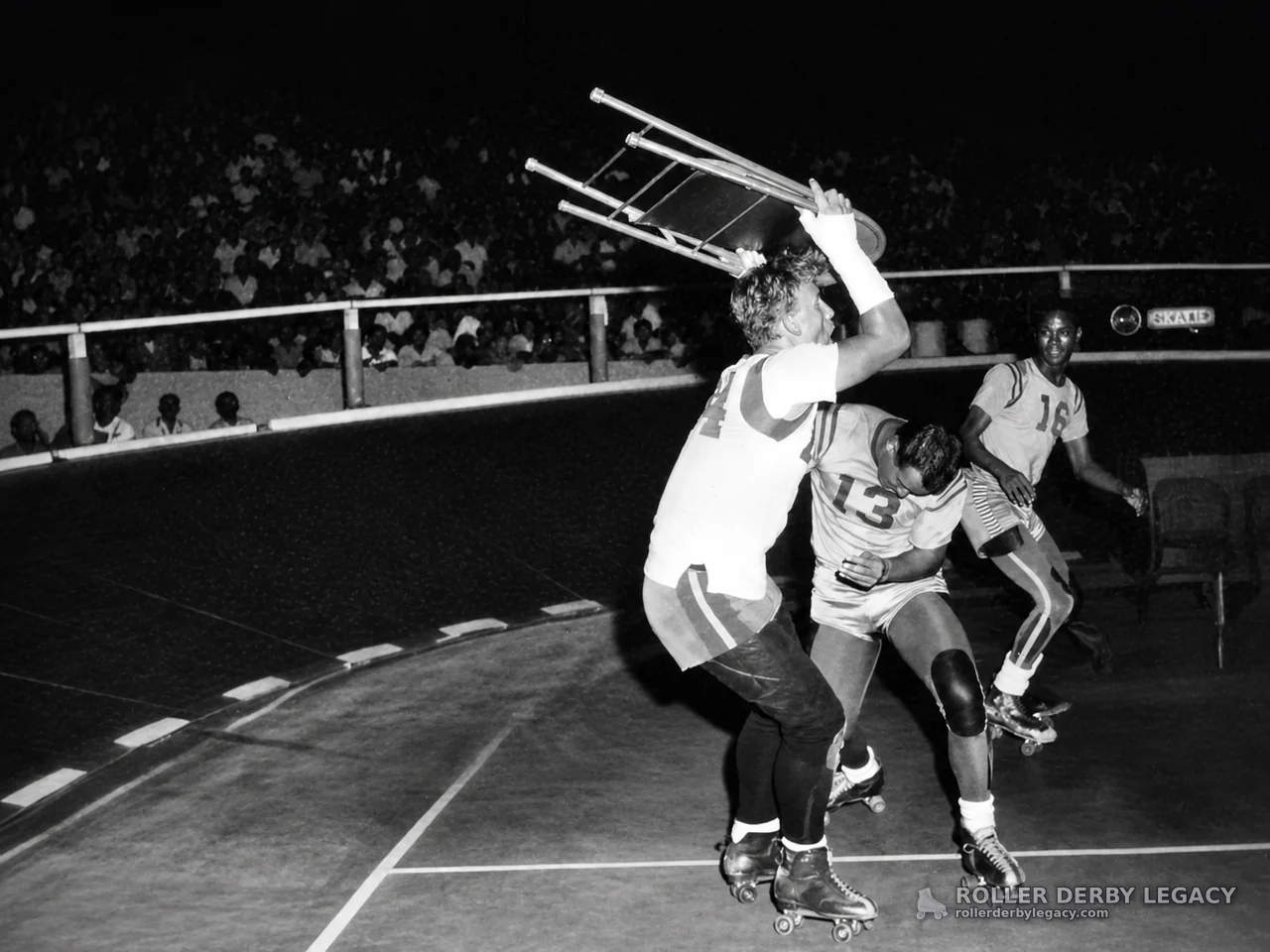 Skater Raises Chair on a Banked Track