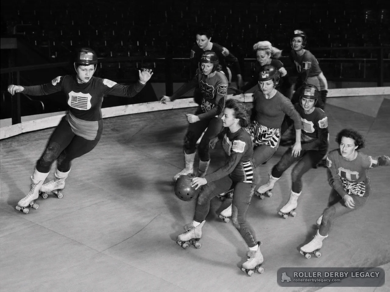 Roller Derby Skaters on a Banked Indoor Track