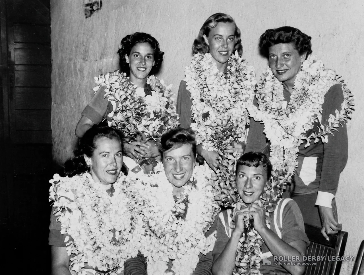 Six Women in Uniforms with Flower Garlands
