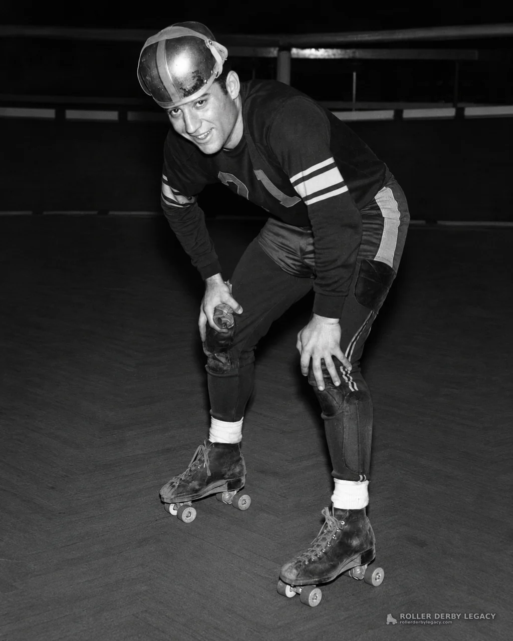 Helmeted Roller Skater Wearing Number 11