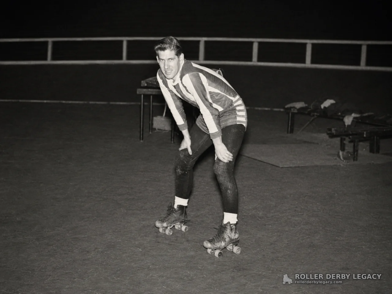 Roller Skater in Striped Uniform on Indoor Rink