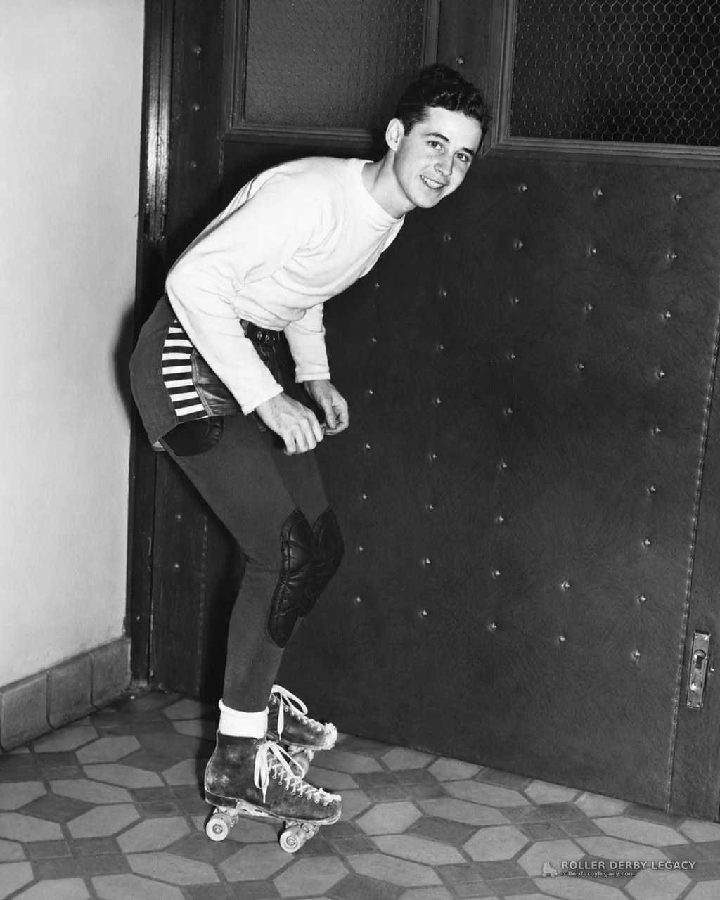 Skater Posing in an Indoor Hallway