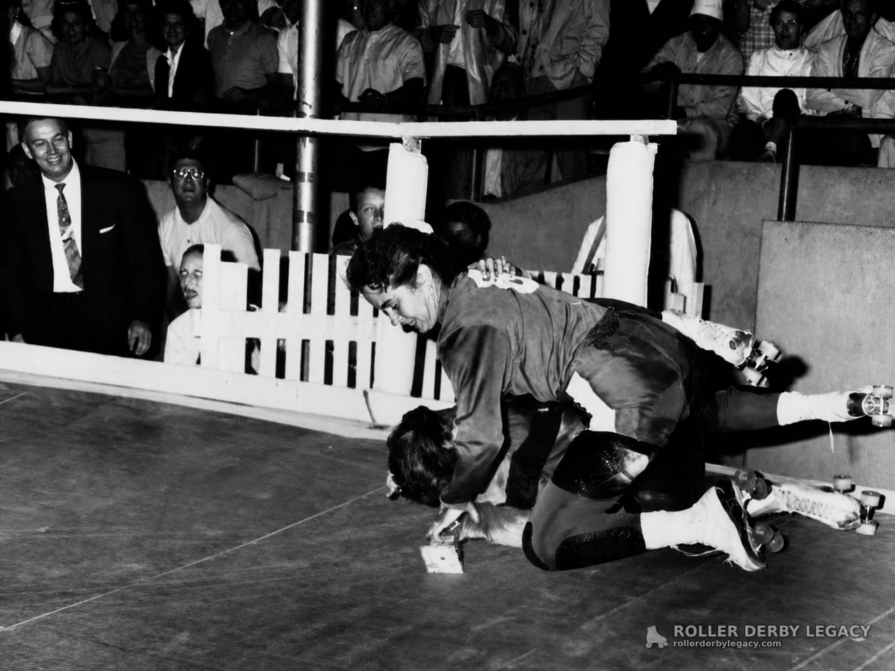 Roller Derby Skaters Tangled on Indoor Track