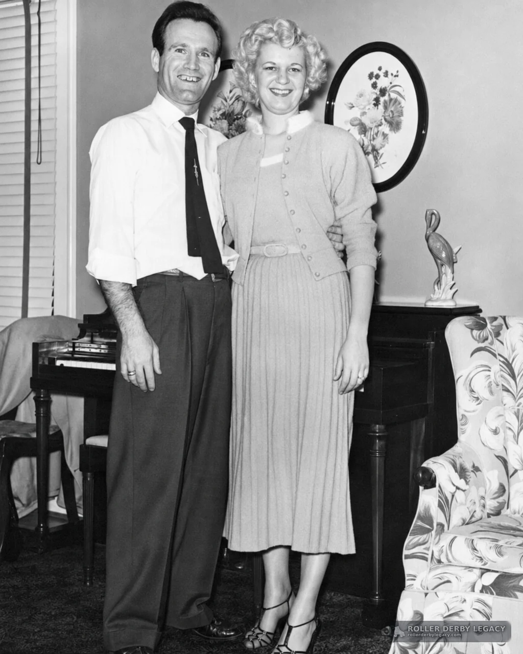 Smiling Couple Posing in a Furnished Indoor Room