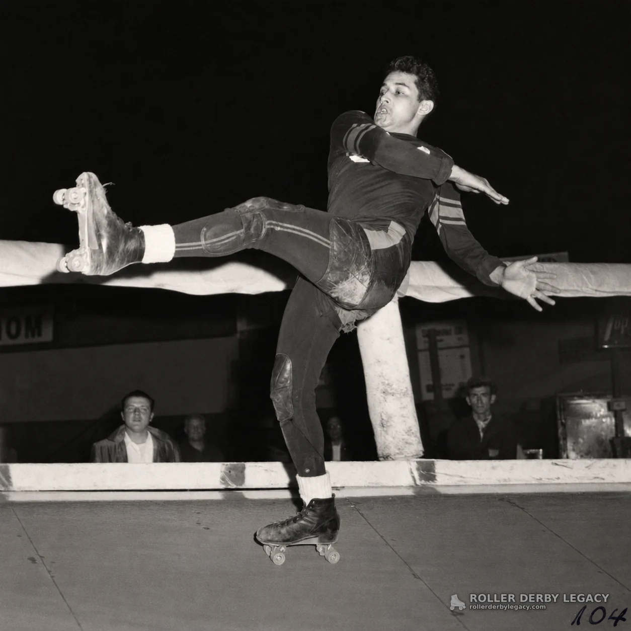 Roller Derby Skater Balancing Near Track Rail
