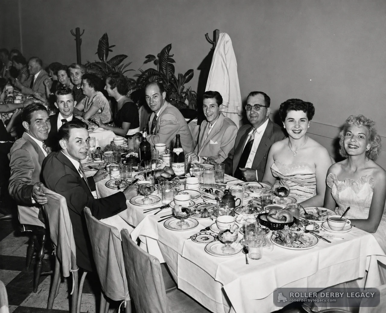 Formal Banquet Group Seated at Dining Tables