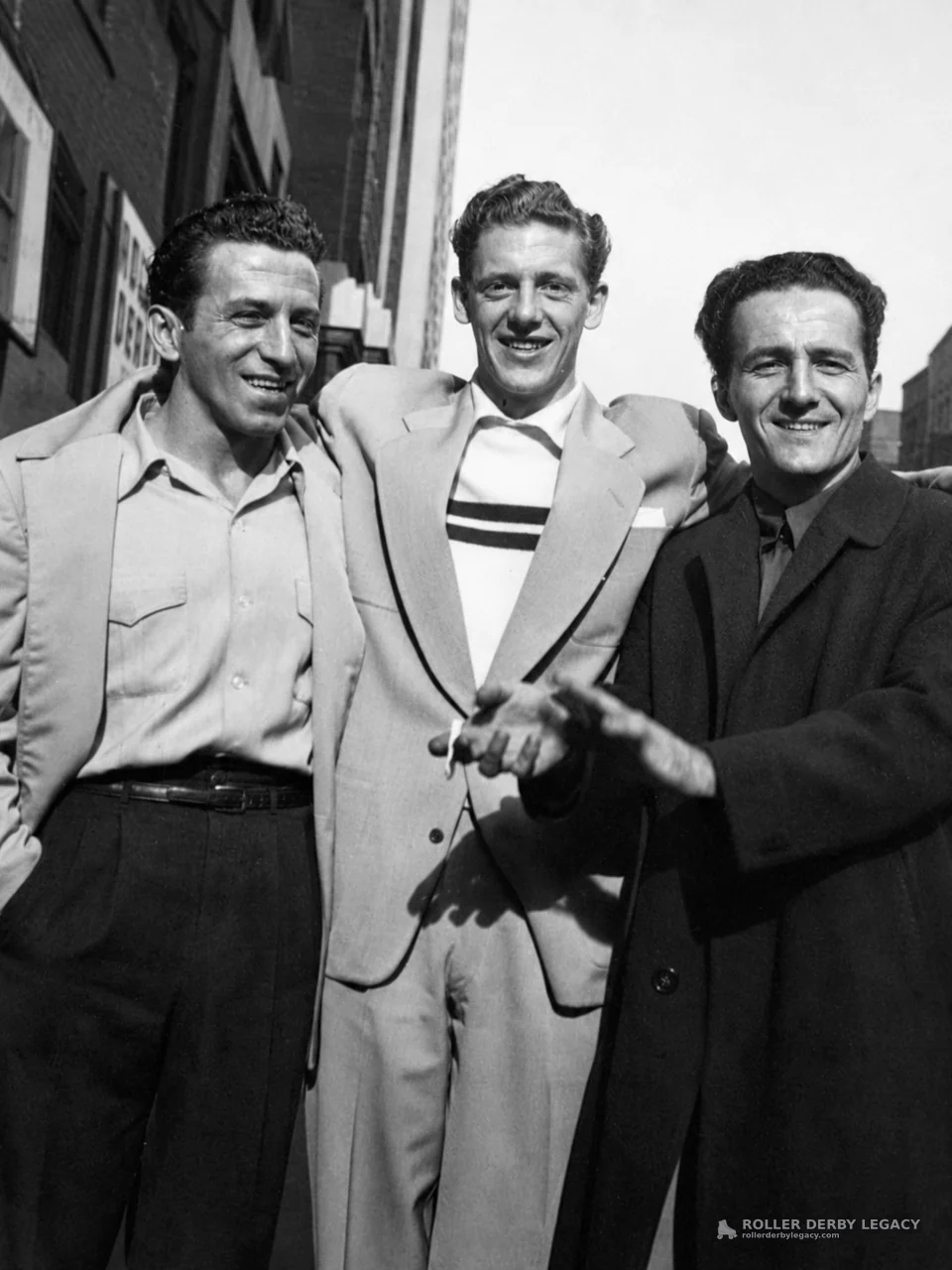 Three Unidentified Men Posing on a City Street