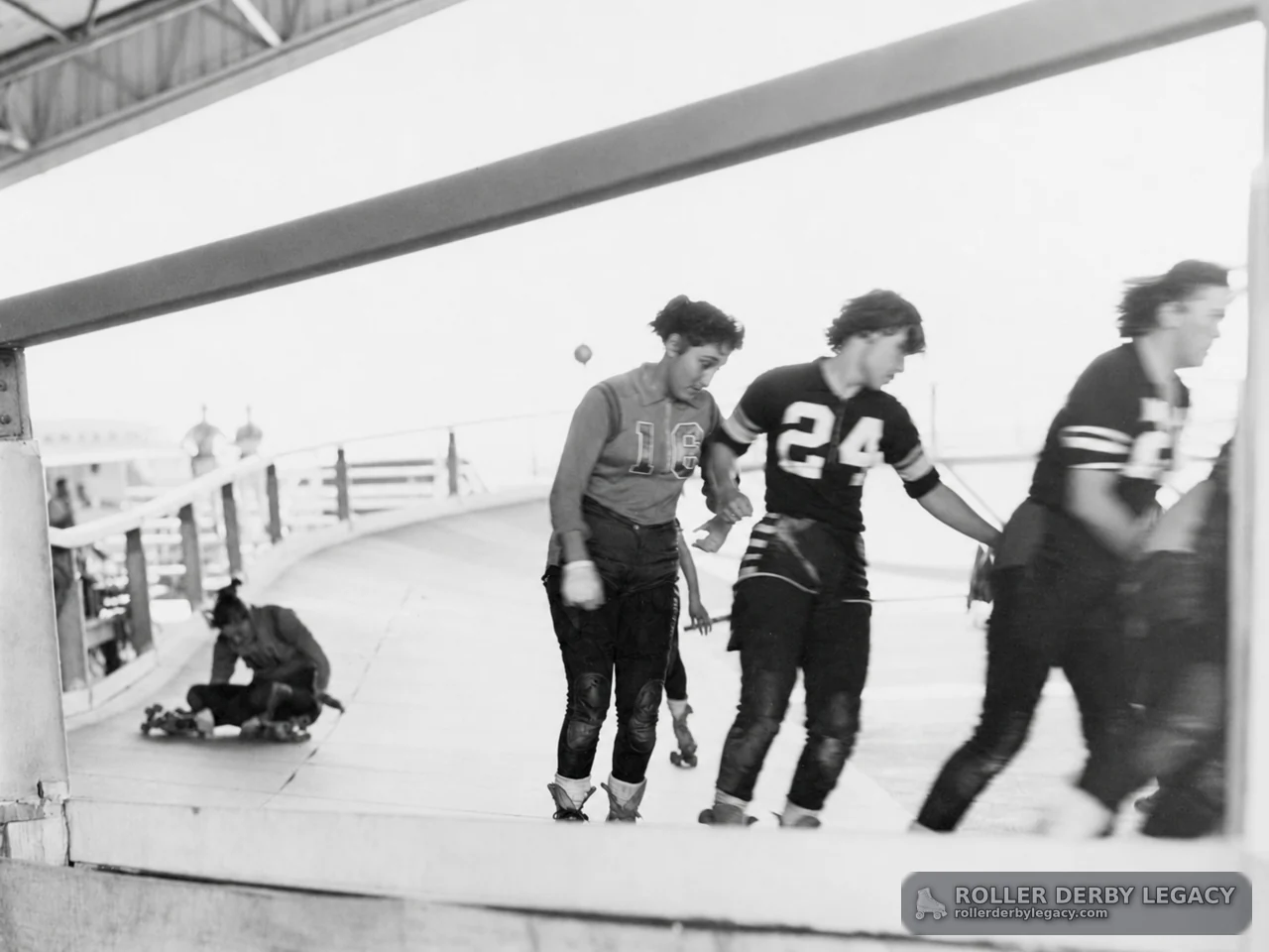 Roller Derby Skaters on a Banked Track