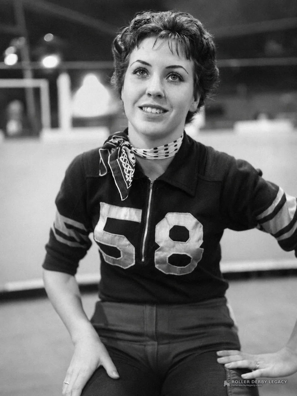 Portrait of Woman in Number 58 Athletic Jersey
