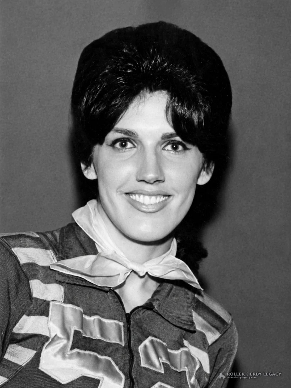 Studio Portrait of Roller Derby Skater Wearing Number 53
