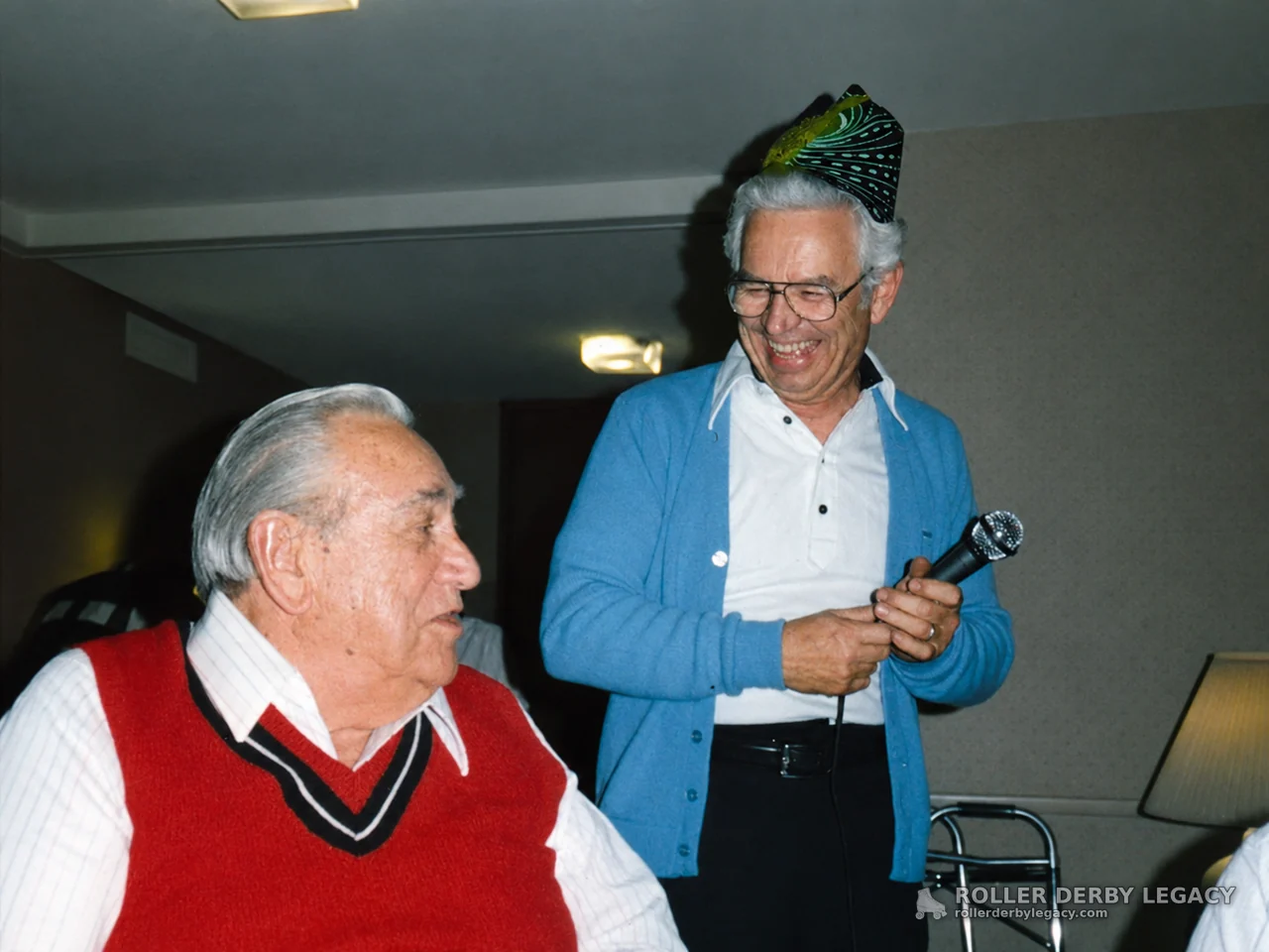 Indoor Gathering with Microphone and Party Hat
