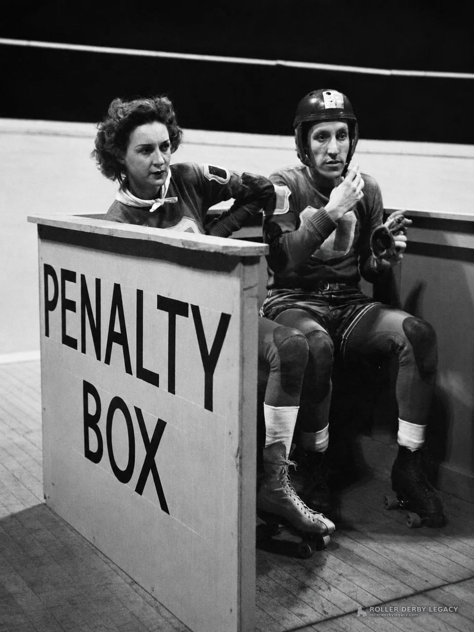 Roller Derby Skaters in the Penalty Box