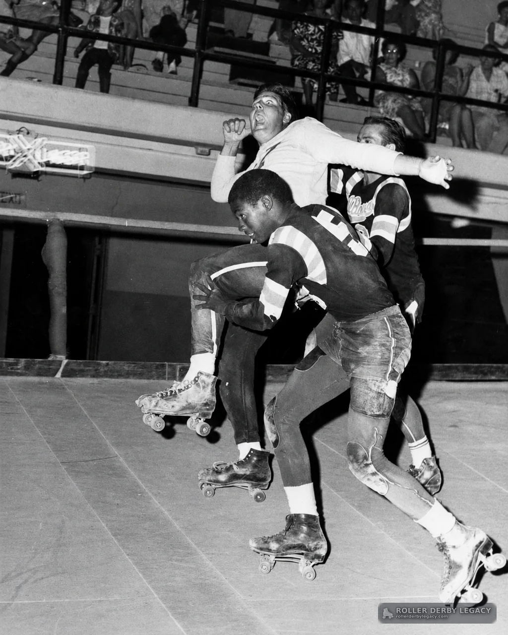 Roller Derby Collision on an Indoor Rink