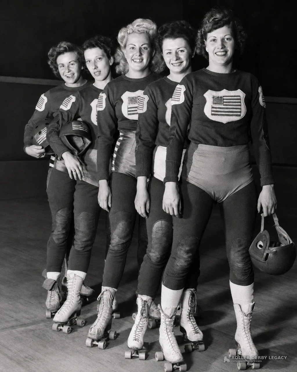 Five Women Roller Skaters in Flag-Emblem Uniforms