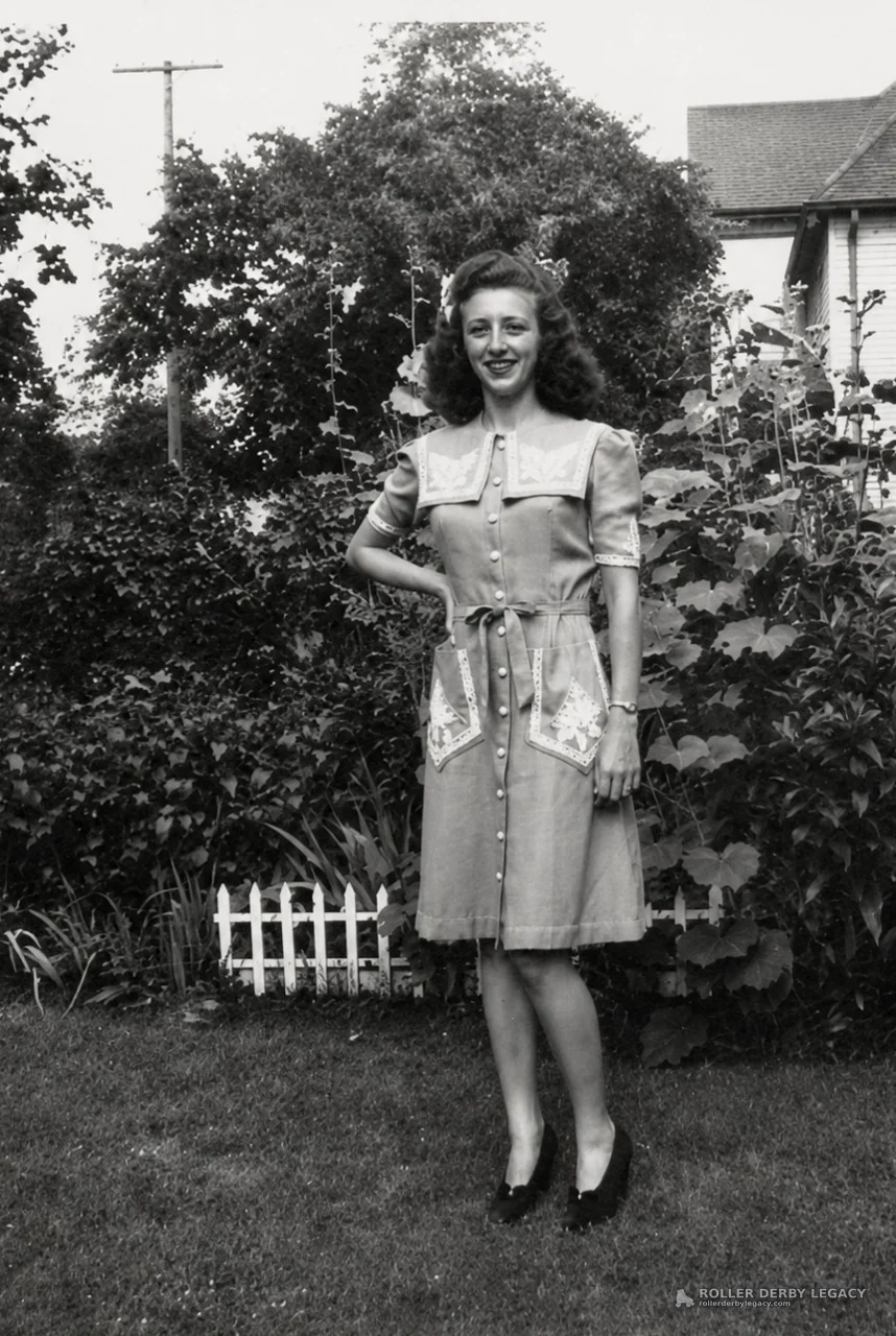 Woman in Button-Front Dress in Garden
