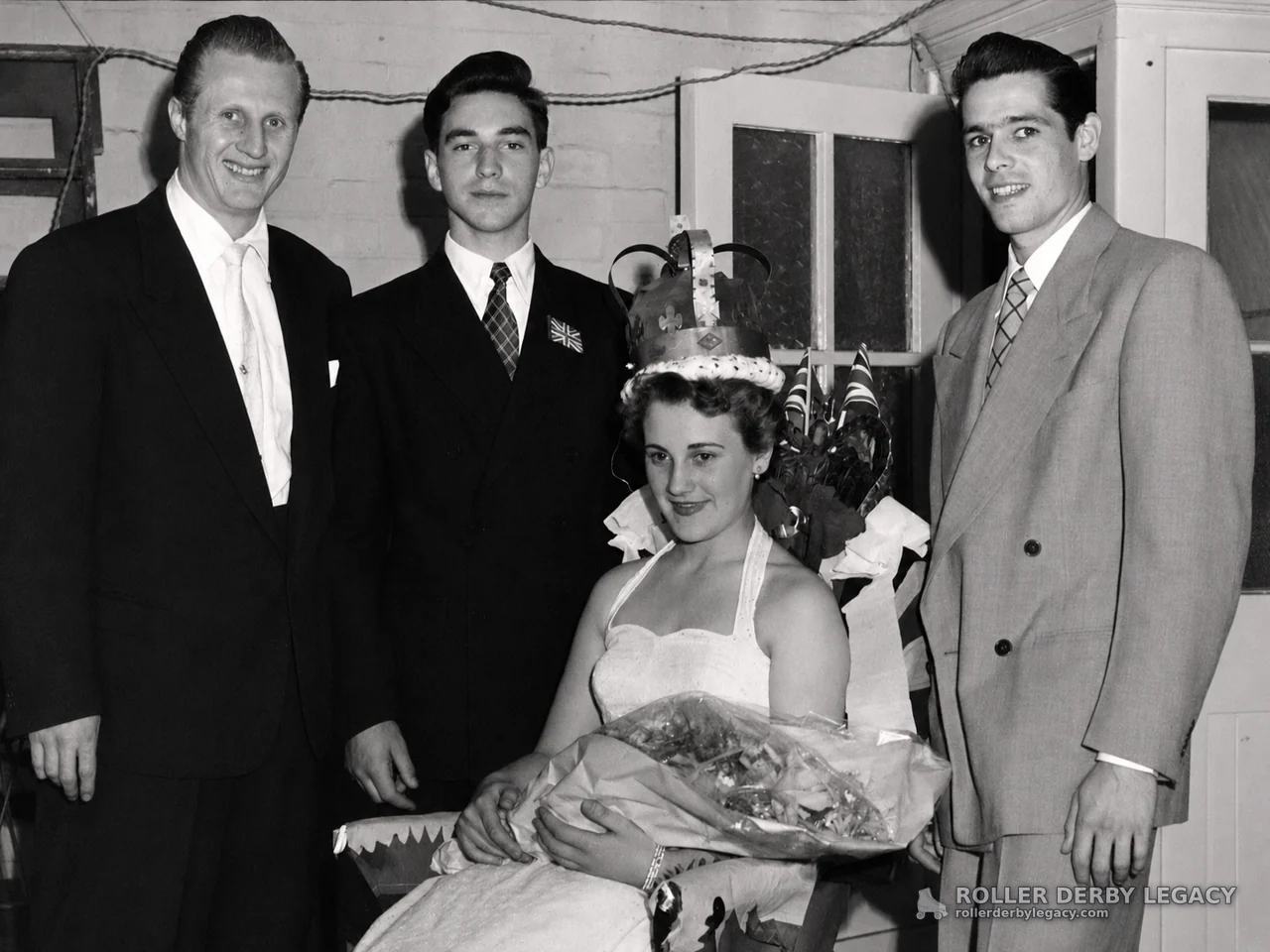 Crowned Woman with Bouquet in Indoor Group Portrait