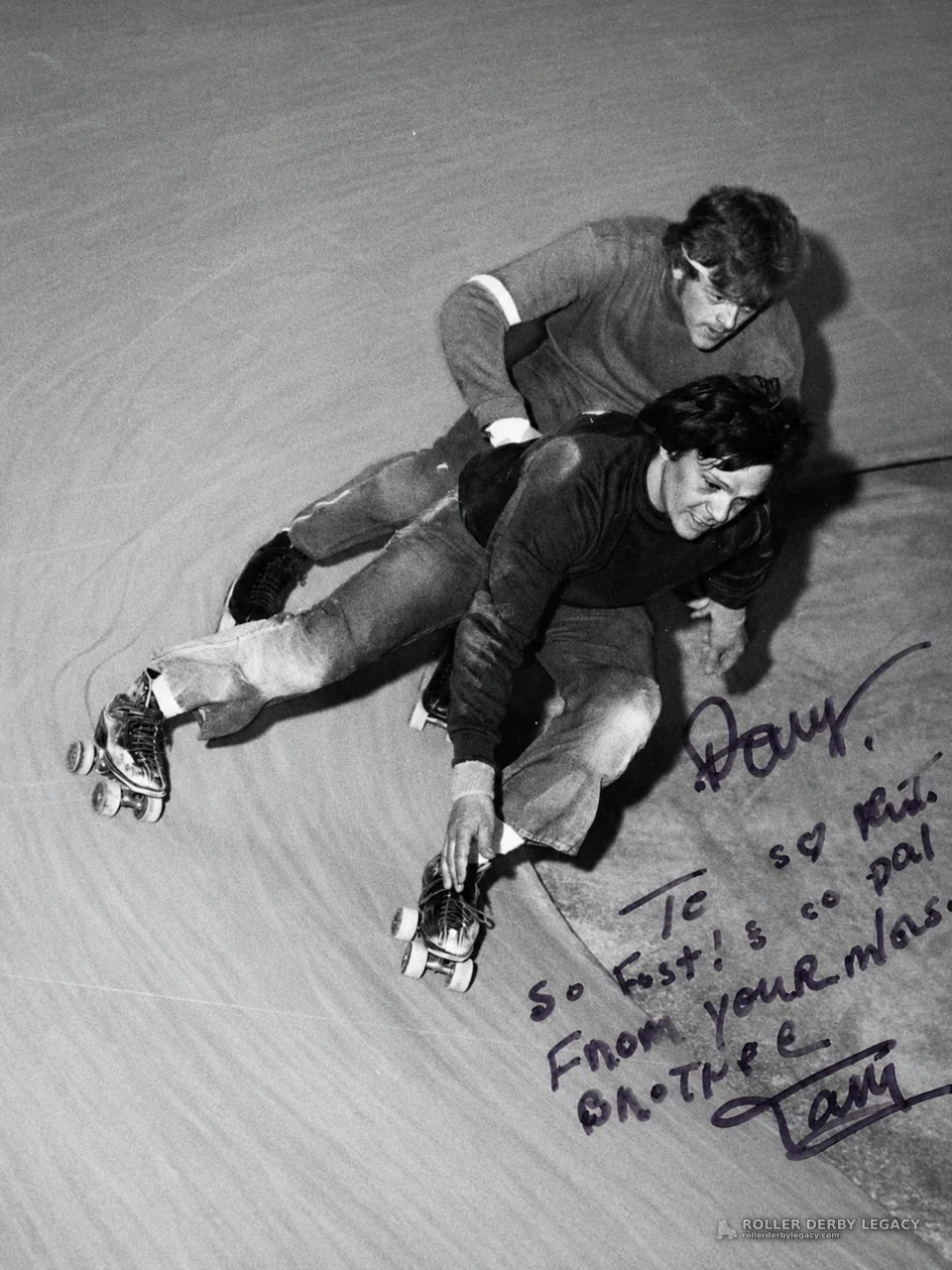 Two Skaters on a Banked Track, Inscribed to Paul