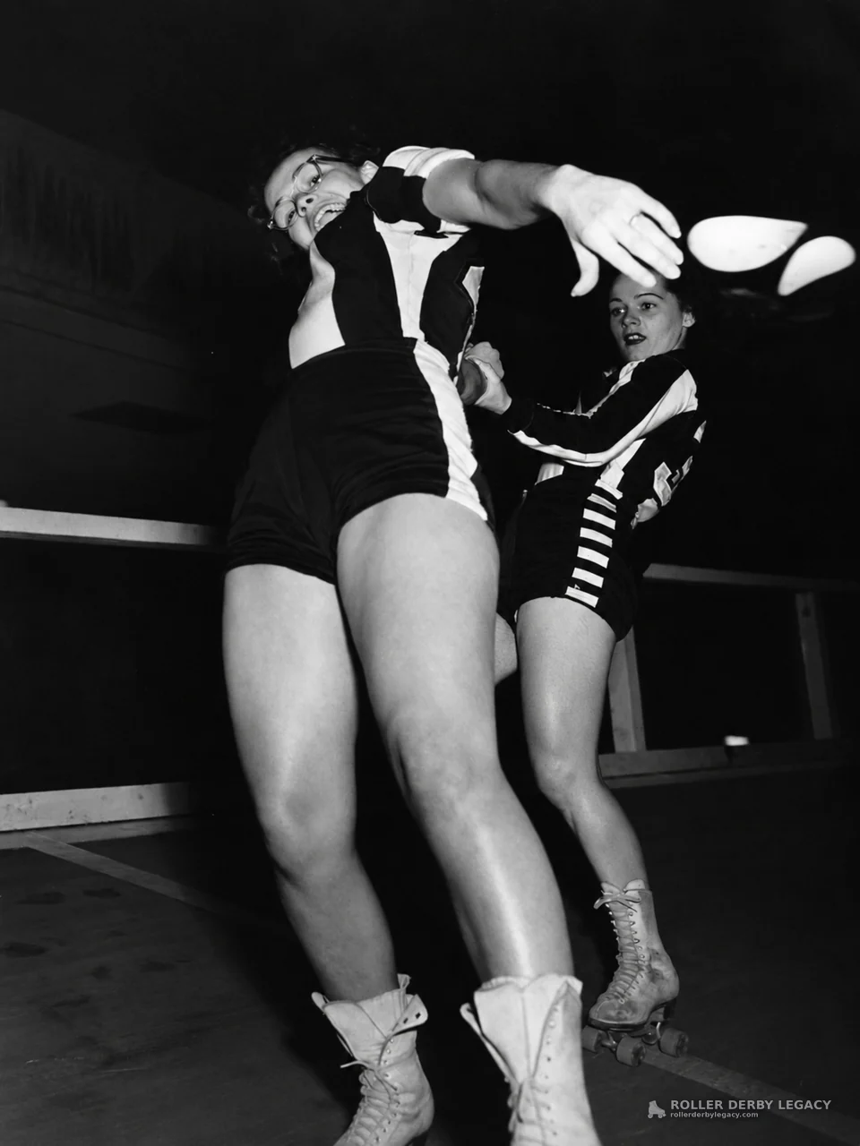 Striped-Uniform Skaters on an Indoor Track