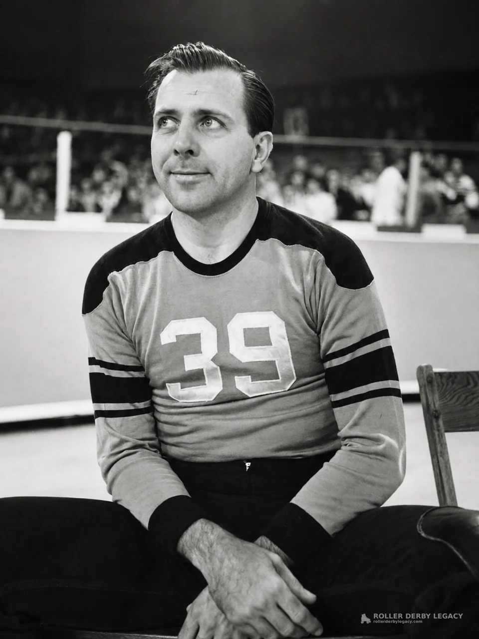 Seated Athlete in Number 39 Jersey