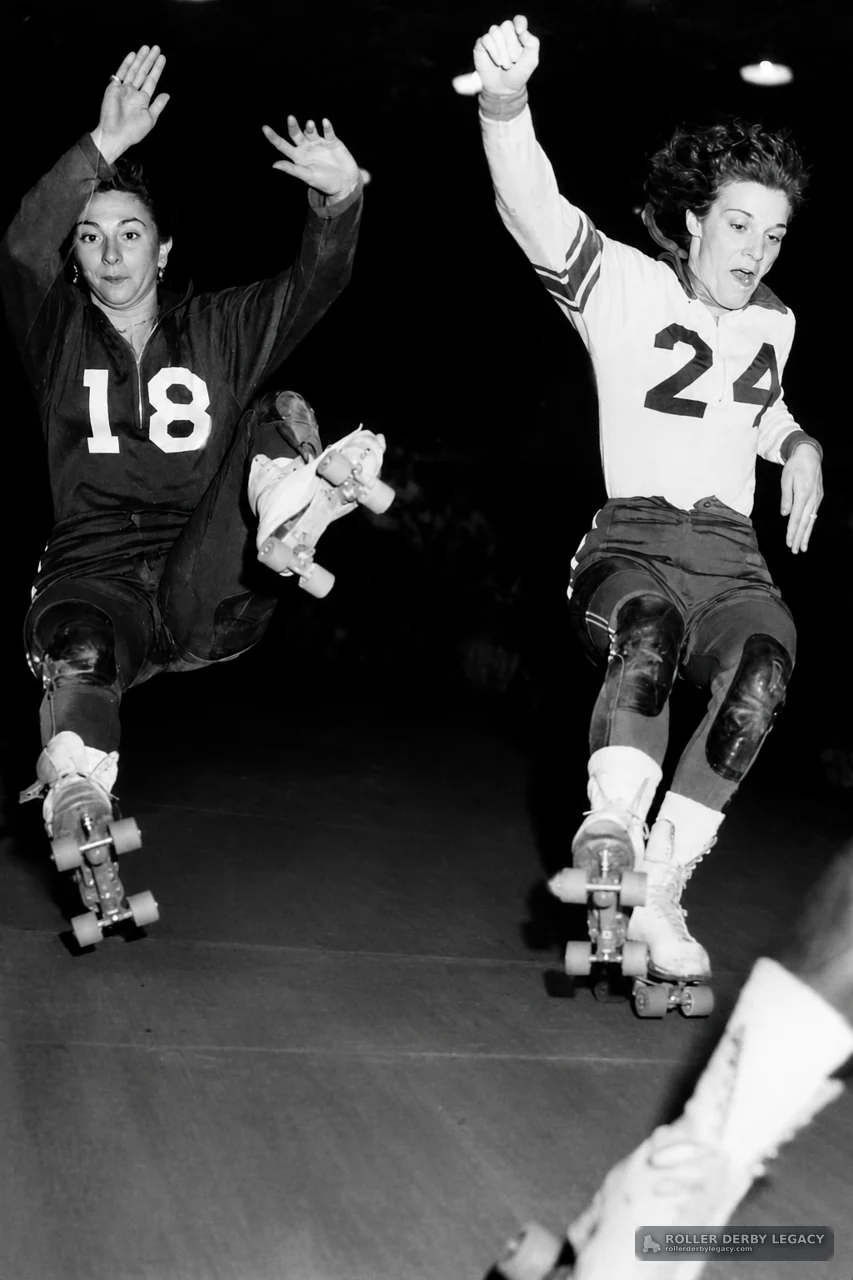 Roller Derby Skaters 18 and 24 in Action