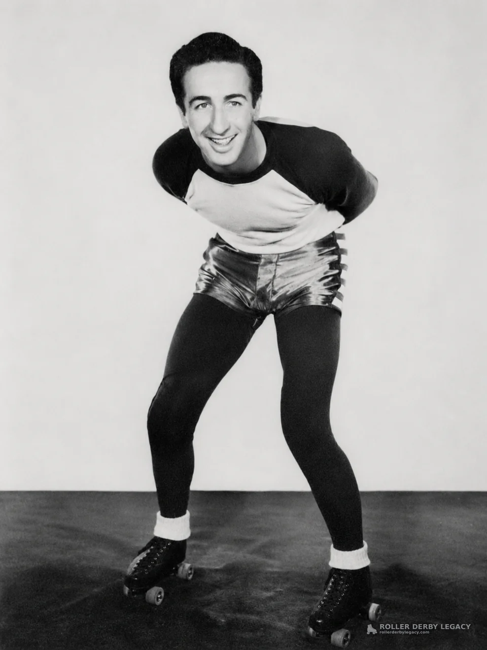 Studio Portrait of a Smiling Roller Skater
