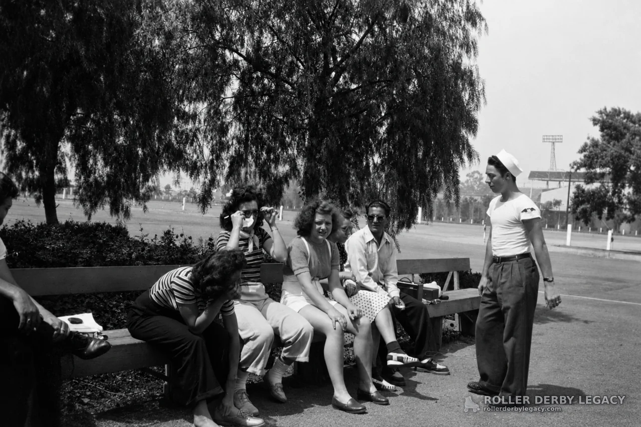 Group on a Bench at Outdoor Sports Grounds, 1940s