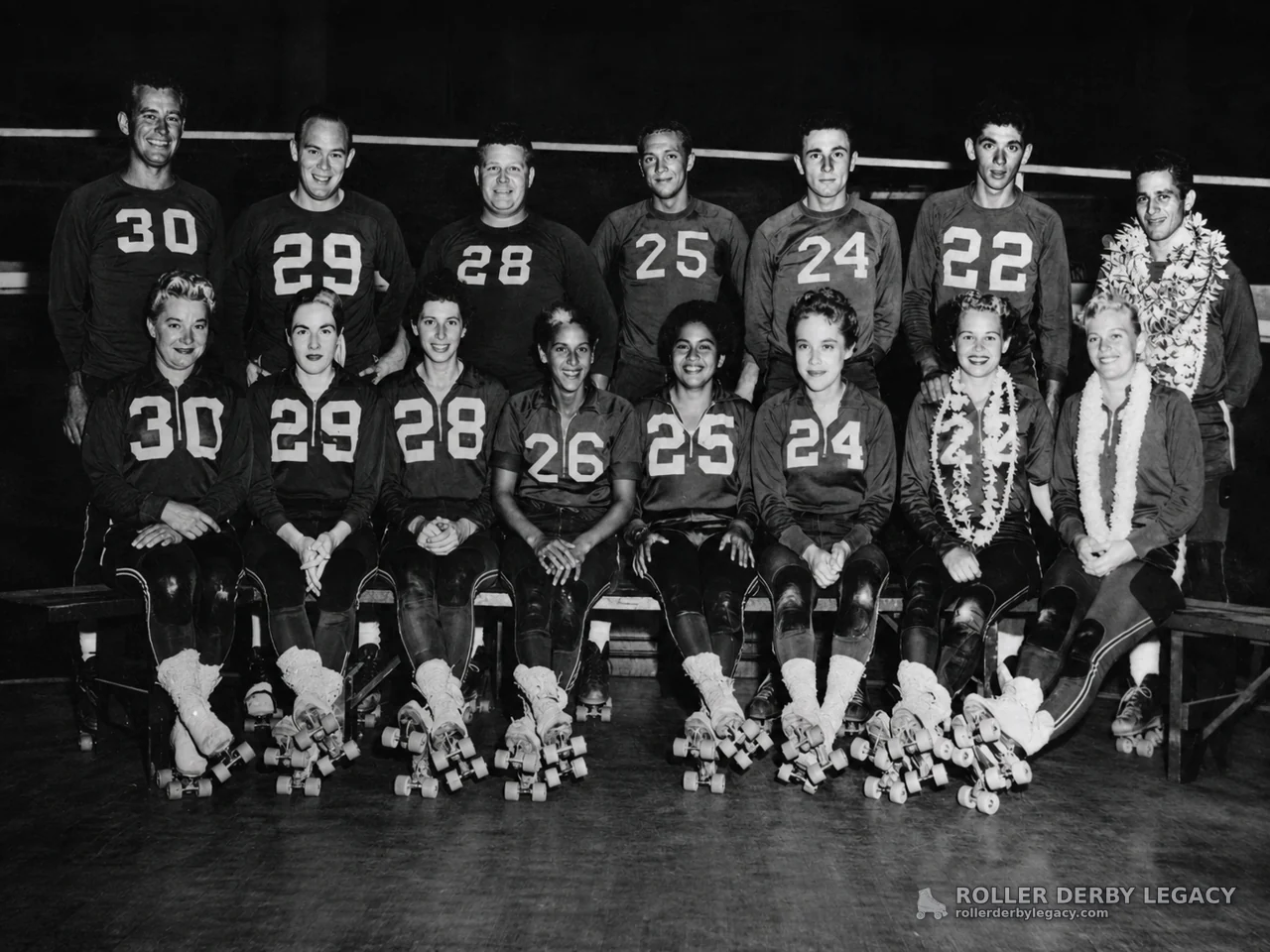 Roller Skaters in Numbered Jerseys at an Indoor Rink